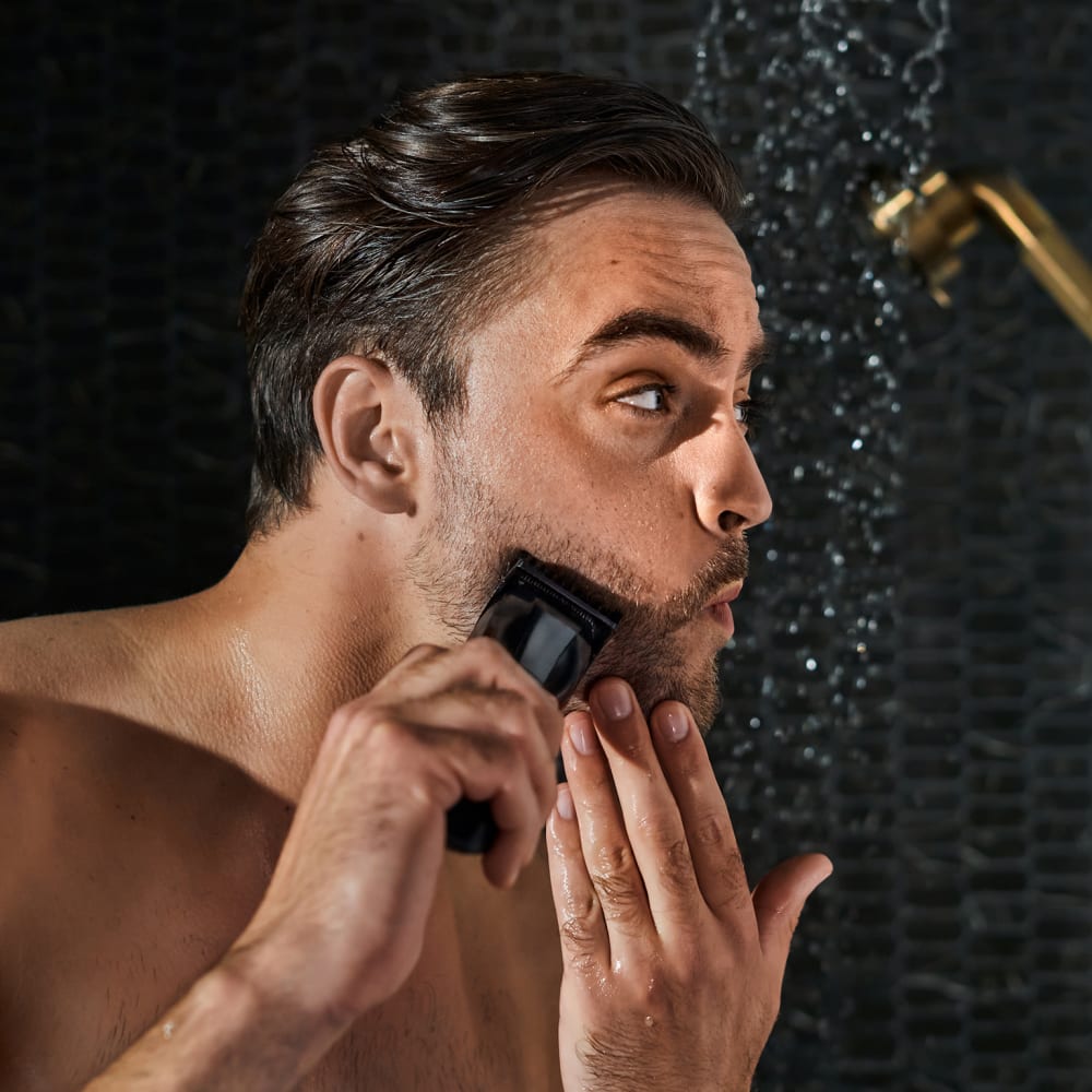Man trimming beard with The Beard Hedger®