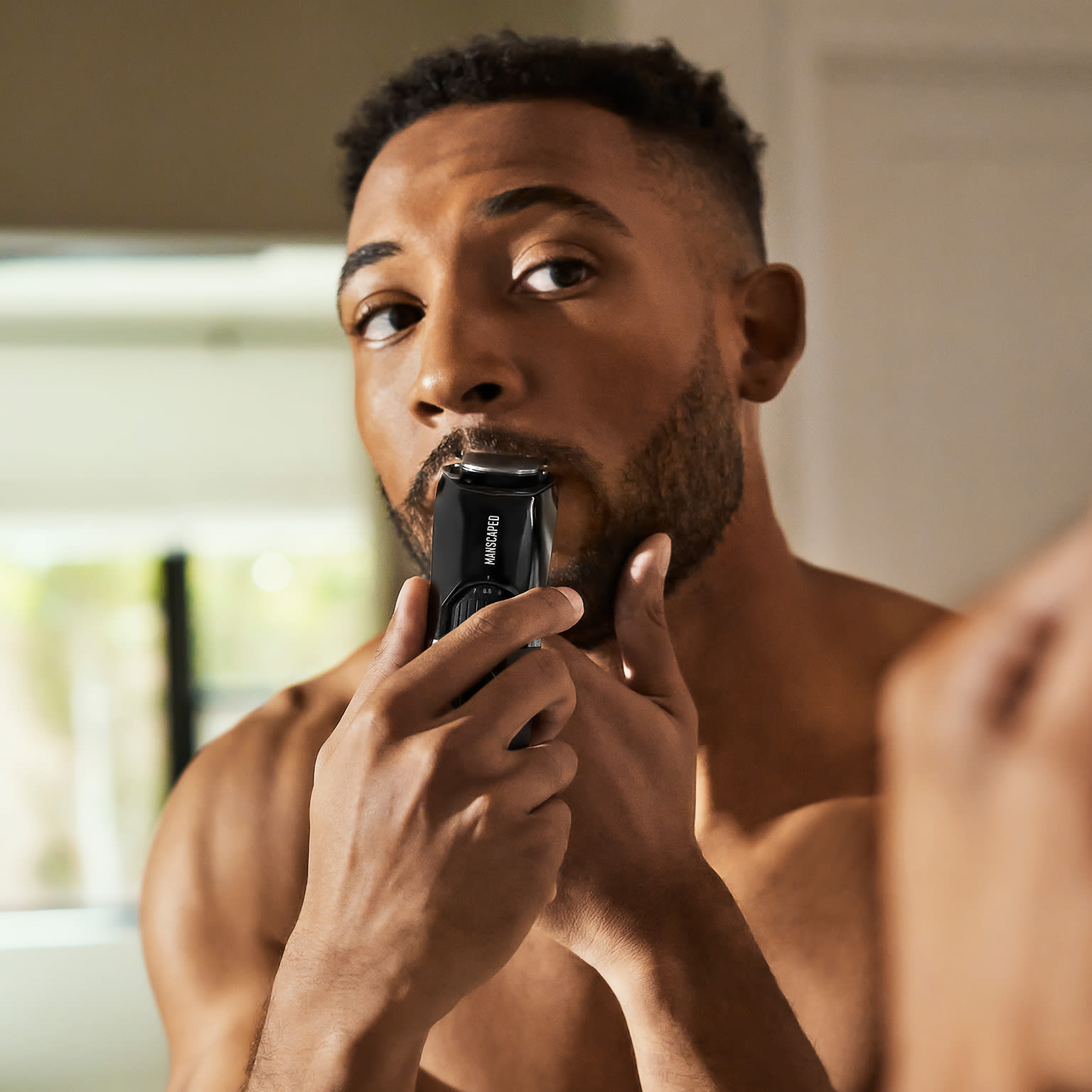 Man shaving beard with The Beard Hedger®