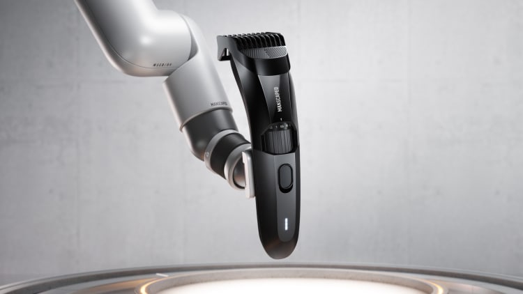 The Beard Hedger® being held by robotic arm